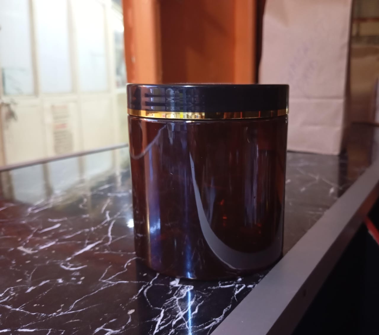 Amber Pet Jar With Black Plastic lid With Gold Strip - 500g